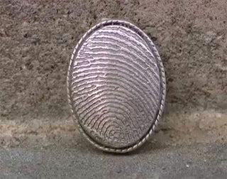 Metal Detectorist Reunites LI Man With Locket Containing His Brother’s Ashes