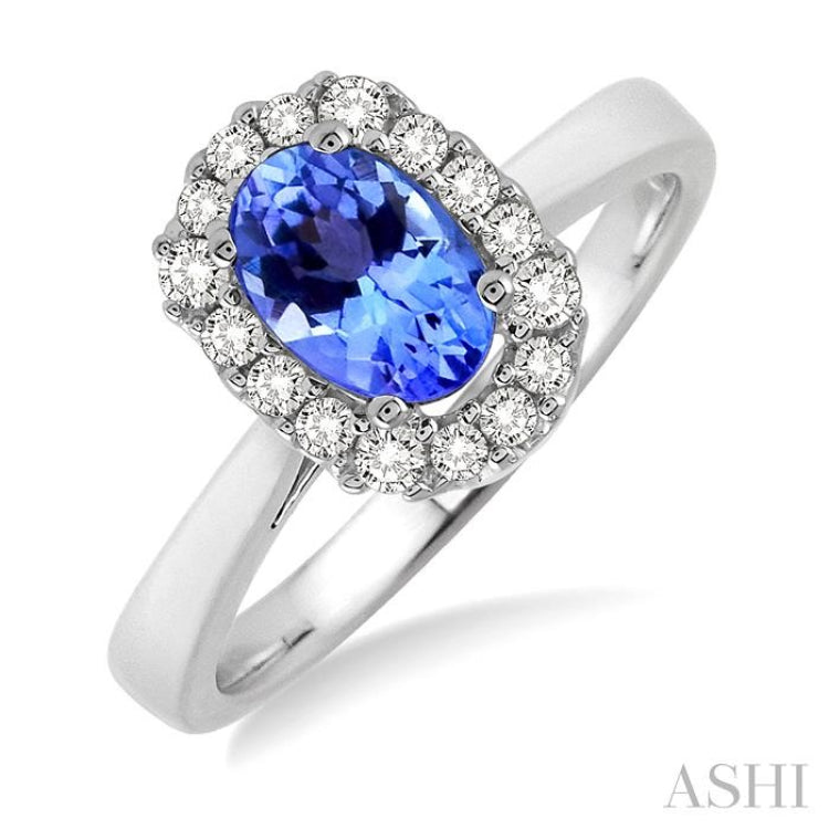 6x4 MM Oval Cut Tanzanite and 1/6 Ctw Round Cut Diamond Ring in 14K White Gold