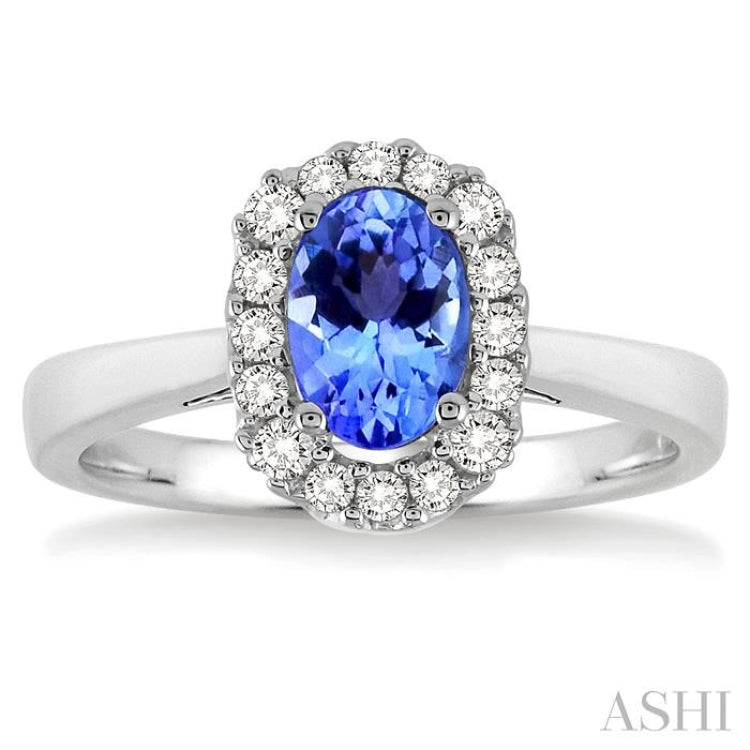 6x4 MM Oval Cut Tanzanite and 1/6 Ctw Round Cut Diamond Ring in 14K White Gold