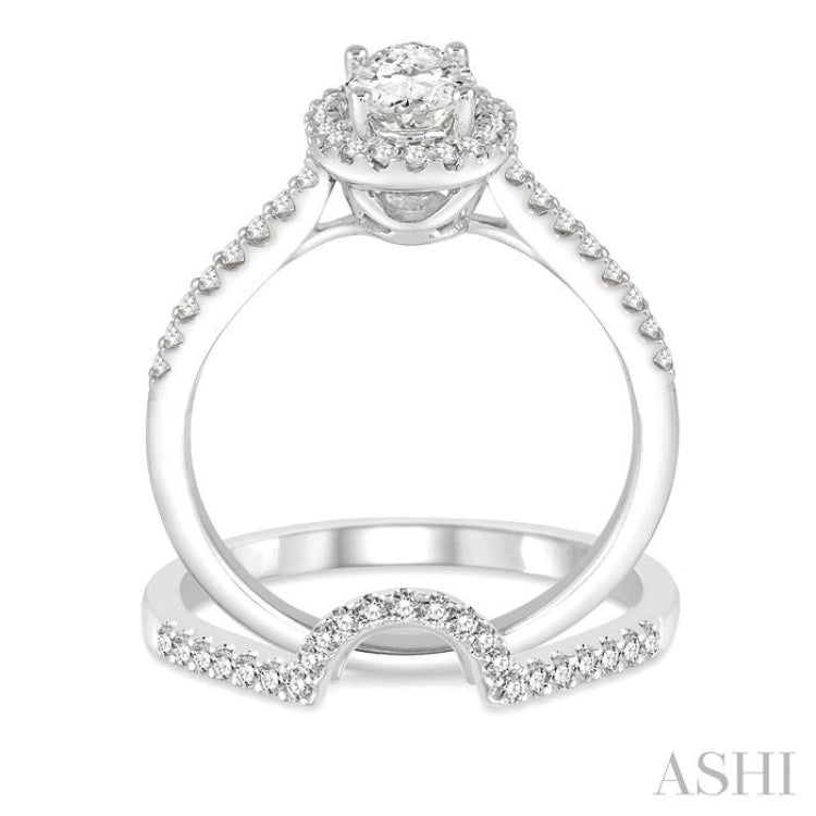 7/8 Ctw Diamond Wedding Set With 3/4 Ctw Oval Shape Engagement Ring and 1/6 Ctw Wedding Band in 14K White Gold