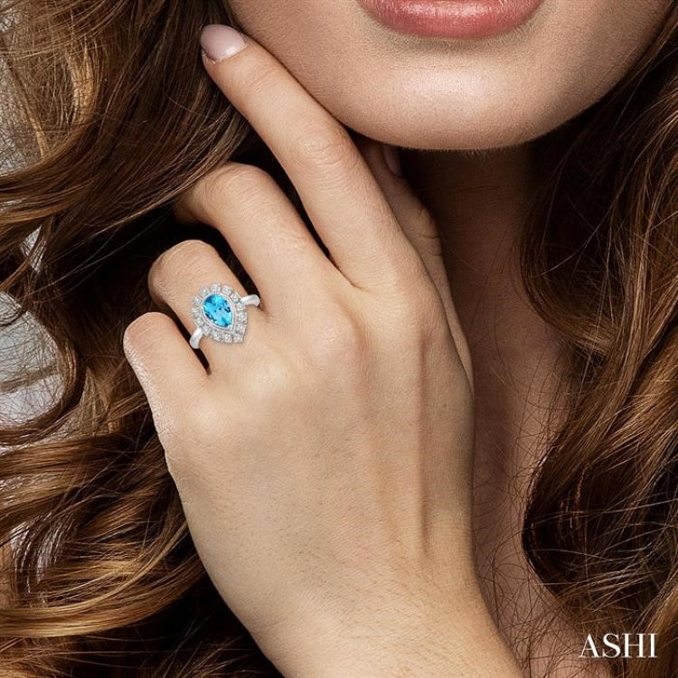 1/10 Ctw Lattice Pear Shape 9x6mm Blue Topaz & Round Cut Diamond Semi Precious Ring in 10K White Gold