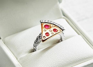 Domino’s Is Giving Away a Pizza-Slice Engagement Ring Topped With Diamonds and Rubies