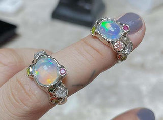 K-Pop Stars HyunA and DAWN Exchange Opal-and-Diamond Engagement Rings