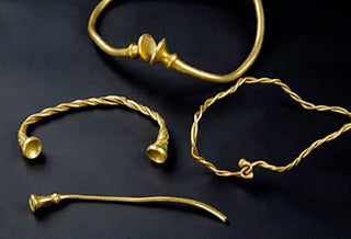 UK Treasure Hunters Unearth Four Golden Torcs Dating Back 2,500 Years