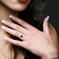 7x5 MM Oval Shape Sapphire and 1/6 Ctw Round Cut Diamond Ring in 14K White Gold