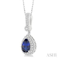 7x5 MM Pear Shape Sapphire and 1/5 Ctw Round Cut Diamond Pendant in 14K White Gold with Chain