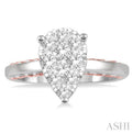 3/4 Ctw Pear Shape Lovebright Round Cut Diamond Ring in 14K White and Rose Gold