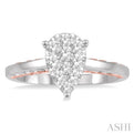 1/2 Ctw Pear Shape Lovebright Round Cut Diamond Ring in 14K White and Rose Gold