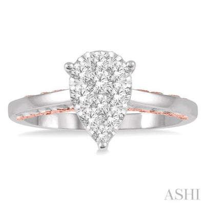 1/2 Ctw Pear Shape Lovebright Round Cut Diamond Ring in 14K White and Rose Gold