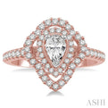 3/4 ctw Pear Shape Center Semi-Mount Round Cut Diamond Engagement Ring in 14K Rose and White Gold