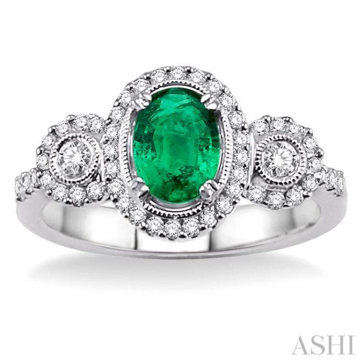 7x5MM Oval Cut Emerald and 1/2 Ctw Round Cut Diamond Ring in 14K White Gold