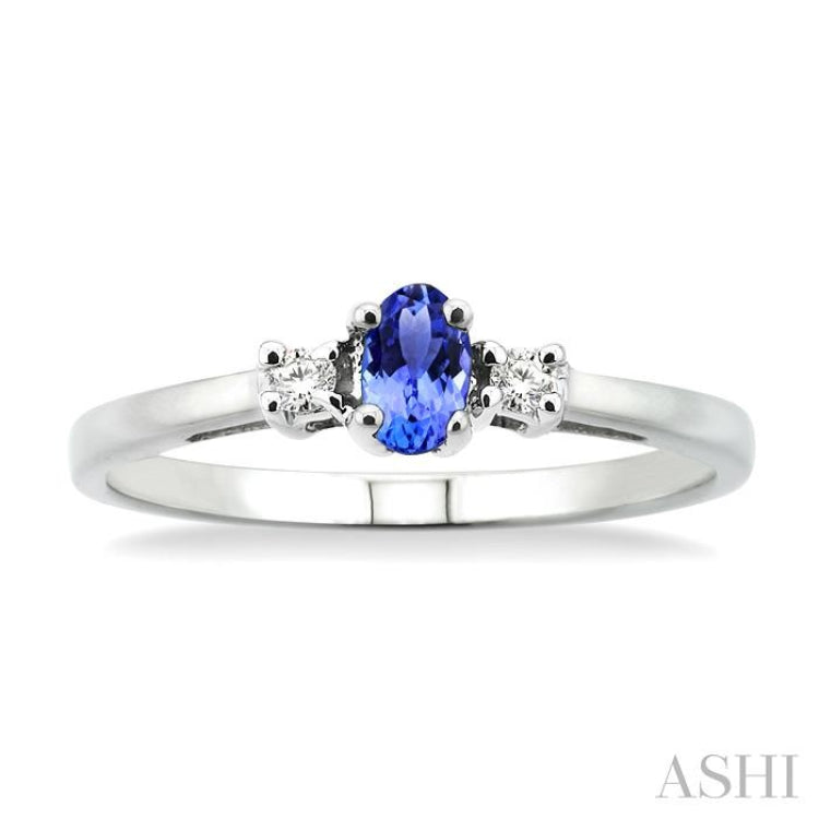 5x3mm Oval Cut Tanzanite and 1/20 Ctw Round Cut Diamond Ring in 10K White Gold