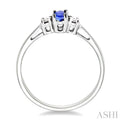 5x3mm Oval Cut Tanzanite and 1/20 Ctw Round Cut Diamond Ring in 10K White Gold