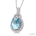 11x9 MM Oval Cut Aquamarine and 1/3 Ctw Round Cut Diamond Pendant in 14K White Gold with Chain