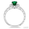 7x5mm Oval Cut Emerald and 1/2 Ctw Round Cut Diamond Ring in 14K White Gold