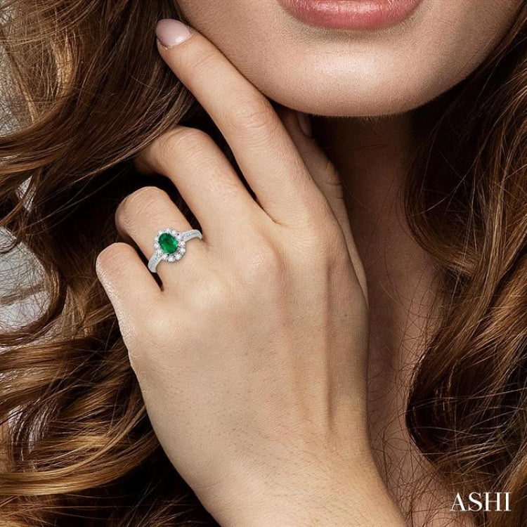 7x5mm Oval Cut Emerald and 1/2 Ctw Round Cut Diamond Ring in 14K White Gold