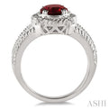 9x7 mm Oval Cut Garnet and 1/50 Ctw Single Cut Diamond Ring in Sterling Silver