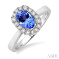 6x4 MM Oval Cut Tanzanite and 1/6 Ctw Round Cut Diamond Ring in 14K White Gold