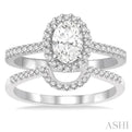 7/8 Ctw Diamond Wedding Set With 3/4 Ctw Oval Shape Engagement Ring and 1/6 Ctw Wedding Band in 14K White Gold
