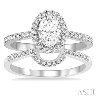 7/8 Ctw Diamond Wedding Set With 3/4 Ctw Oval Shape Engagement Ring and 1/6 Ctw Wedding Band in 14K White Gold