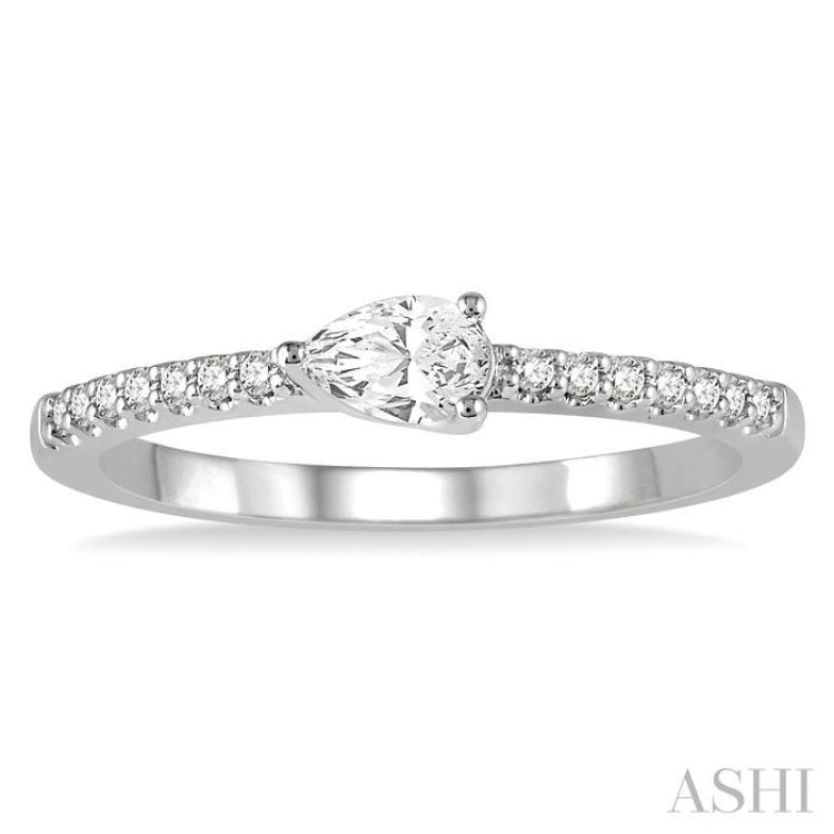 1/3 Ctw Pear Shape & Round Cut Diamond East West Ring in 14K White Gold