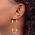 14k Polished 2x55mm Lightweight Tube Hoop Earrings