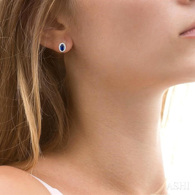 1/8 ctw Round Cut Diamond and 5X3MM Oval Shape Sapphire Halo Precious Stud Earrings in 10K White Gold