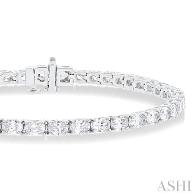 5 1/2 ctw East West Oval Cut Diamond Fashion Tennis bracelet in 14K White Gold