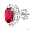 1/8 ctw Round Cut Diamond and 5X3MM Oval Shape Ruby Halo Precious Stud Earrings in 10K White Gold