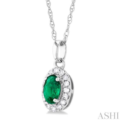 1/20 ctw Round Cut Diamond and 5X3MM Oval Shape Emerald Halo Precious Pendant with Chain in 10K White Gold