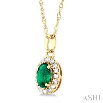 1/20 ctw Round Cut Diamond and 5X3MM Oval Shape Emerald Halo Precious Pendant with Chain in 10K Yellow Gold