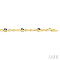 1/10 ctw Oval Cut 4X3MM Sapphire and Round Cut Diamond Precious Bracelet in 10K Yellow Gold