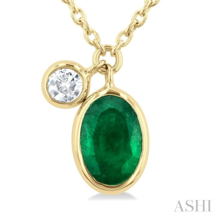 1/20 ctw Oval Cut 6X4MM Emerald and Bezel Set Round Cut Diamond Precious Necklace in 14K Yellow Gold