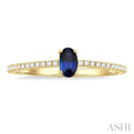 1/10 ctw Petite 5x3 MM Oval Cut Sapphire and Round Cut Diamond Precious Fashion Ring in 10K Yellow Gold