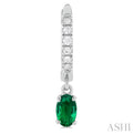1/8 ctw Petite 5X3MM Oval Cut Emerald and Round Cut Diamond Precious Fashion Huggies in 10K White Gold