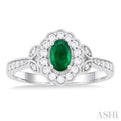 1/4 Ctw Scalloped Halo 6X4 MM Oval Cut Emerald and Round Cut Diamond Precious Ring in 14K White Gold
