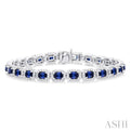 2 1/5 ctw 4X3 MM Sapphire and Round Cut Diamond Halo Precious Tennis Bracelet in 14K White Gold