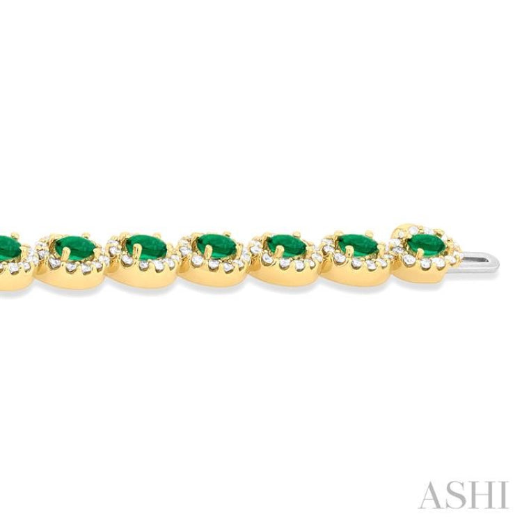 2 1/6 ctw Oval Cut 4X3 MM Emerald and Round Cut Diamond Halo Precious Tennis Bracelet in 14K Yellow Gold