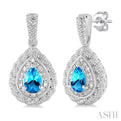 1/20 ctw Pear Cut 6X4MM Blue Topaz and Round Cut Diamond Semi Precious Earring in Sterling Silver