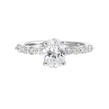 A magnificent oval diamond takes center stage, framed by a breathtaking alternation of fancy and round diamonds is sure to delight her.