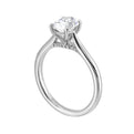 Effortless and classy this dazzling four prong oval solitaire ring features a clean, classic look with a sleek band.
