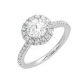 Dazzle with classic round solitaire framed by a sparkling halo. The studded shank adds a touch of classic look, making this ring a timeless symbol of elegance.