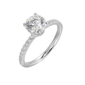 Shine from every angle with this gorgeous round solitaire hidden halo engagement ring. This timeless design offers elegance making it everlasting symbol of your love.