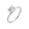 The dazzling solitaire diamond take center stage. The petite band adds to the sleek, classic look.