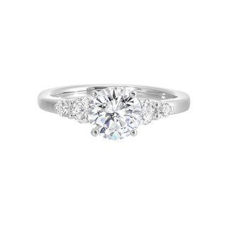 Five times diamonds for five times sparkles. A classic, lustrous band completes the look of this five stone engagement ring.