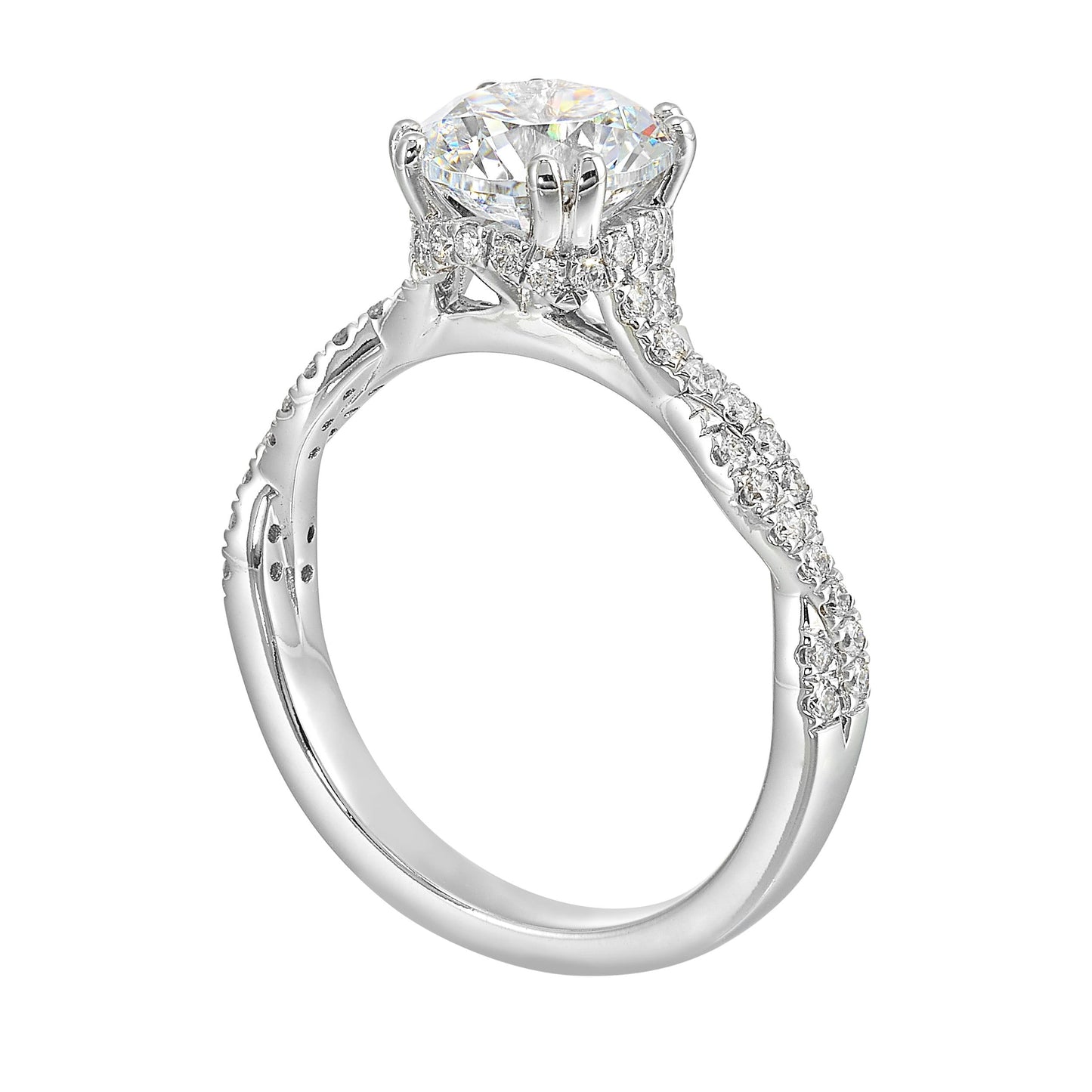 Stunning with a round solitaire diamond set in dual prongs atop a modern crisscross band. The unique twist on timeless elegance is perfect for the modern bride.
